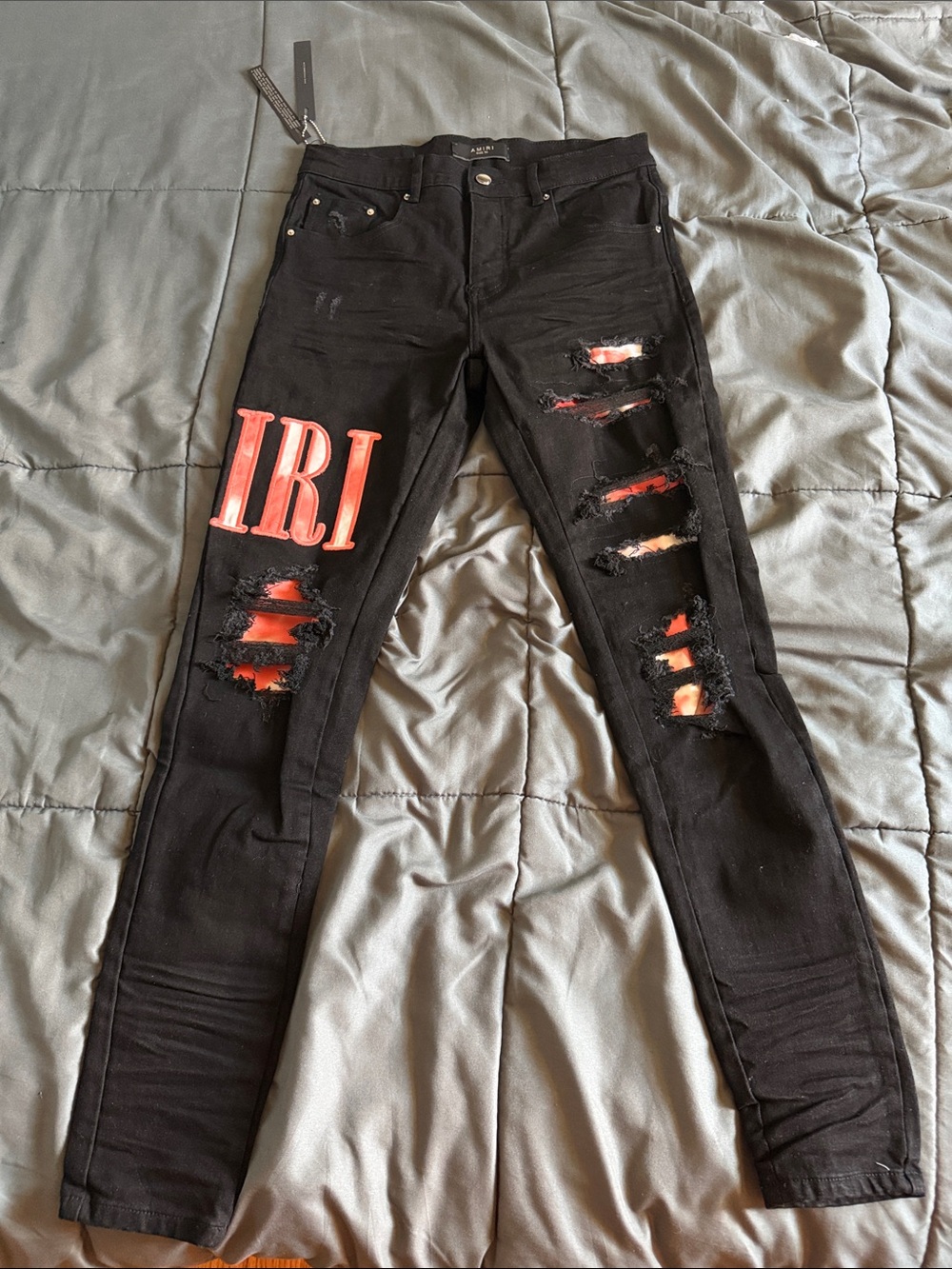 AMIRI Black Skinny Jeans with Red Patch Lettering